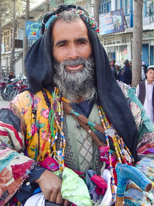 Passing woman with burqa and a splash of colour