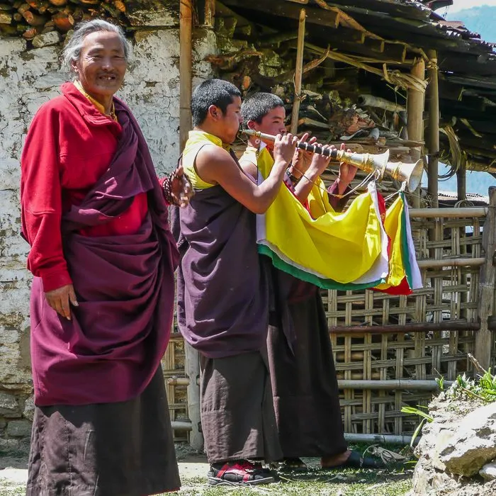 Lamas giving a send-off in Eastern Bhutan
