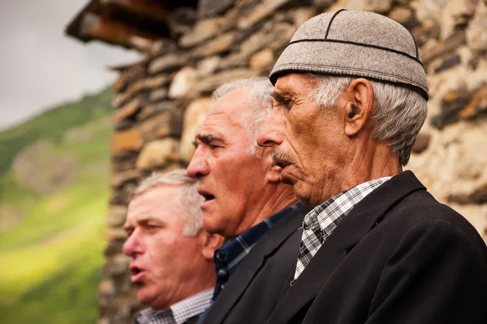 Three svanetian singers at a traditional folk festival, Ushguli (© Mahroch | Dreamstime.com)