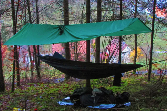 Simple camp above a village